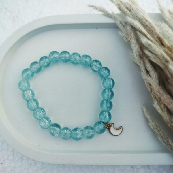 Glass bead bracelet with charm