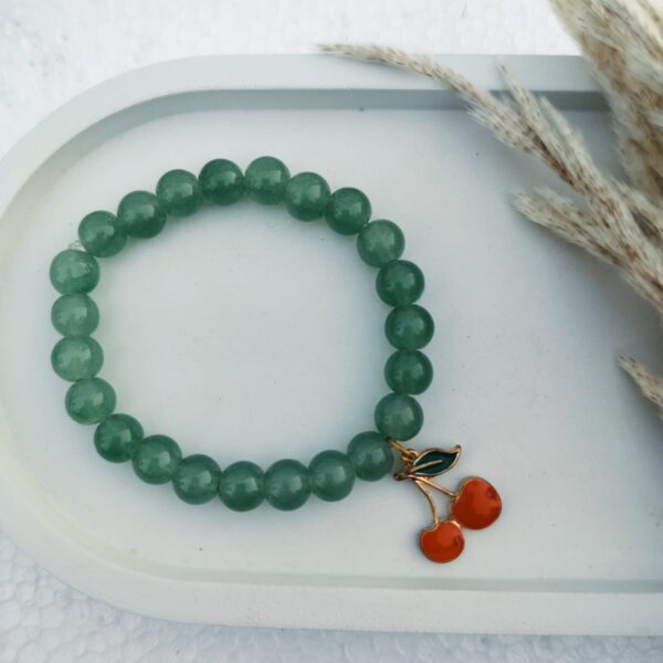 Glass bead bracelet with charm
