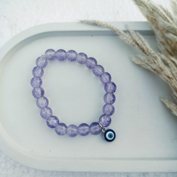 Glass bead bracelet with charm