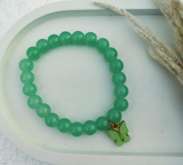 Glass bead bracelet with charm