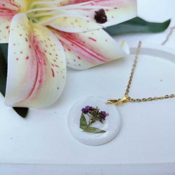 Purple flower necklace with real shell base