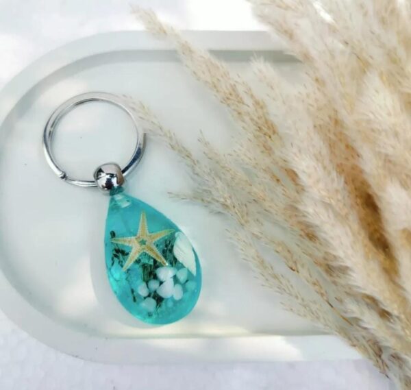 Starfish glow in dark keychain