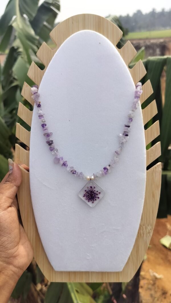 Amethyst gemstone necklace with real flower pendant